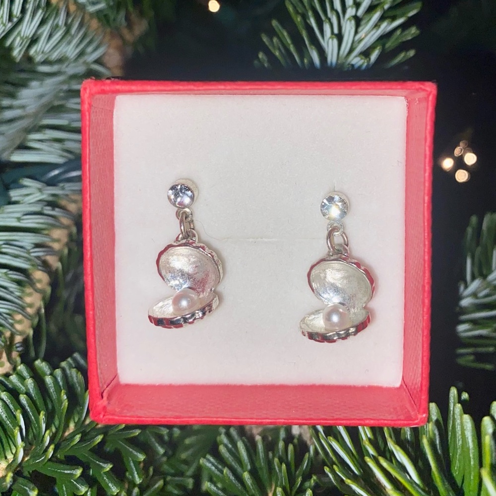 Pearl in a clam silver earrings